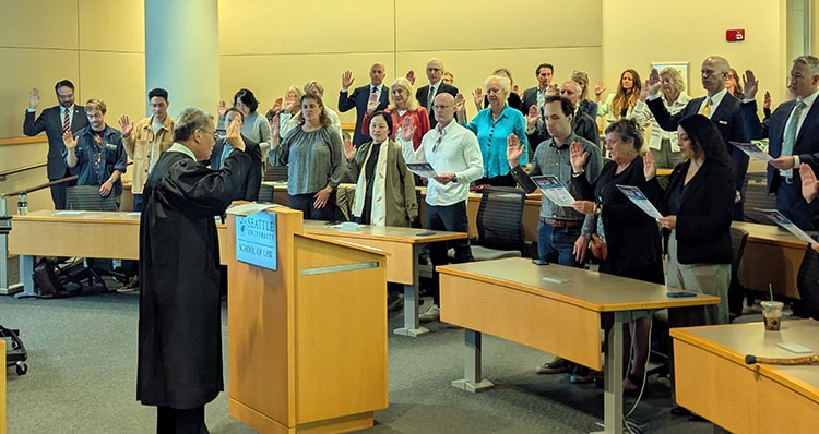 Legal professionals retaking the Oath of Attorney at Seattle University School of Law on Law Day, May 1, 2025.