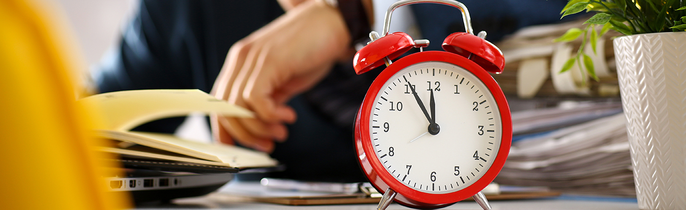 Clock in front of a lawyer