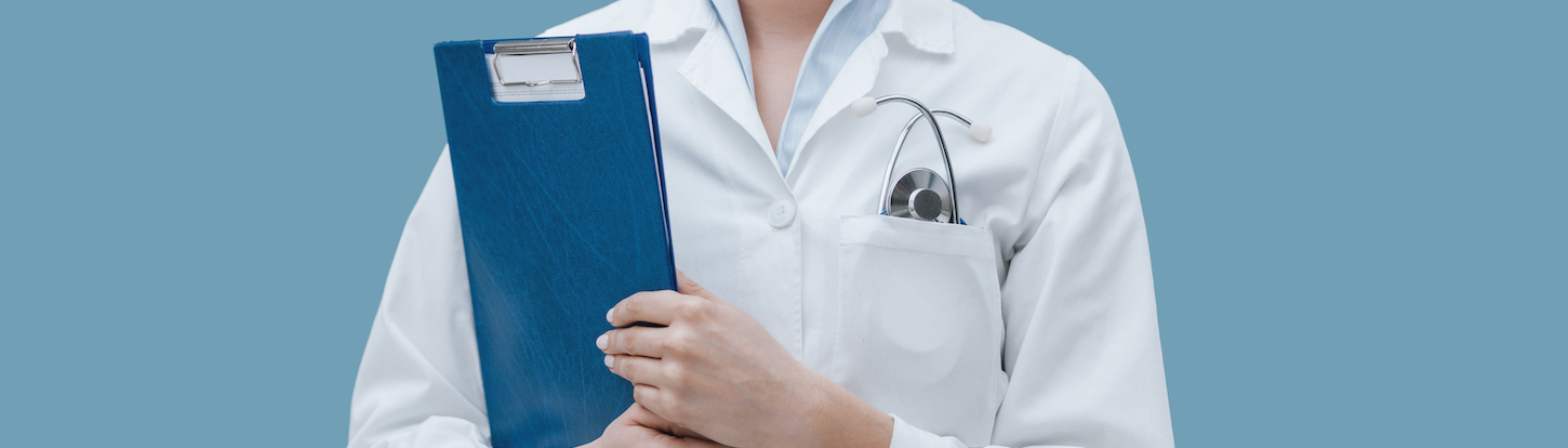 Female medical professional holding clipboard