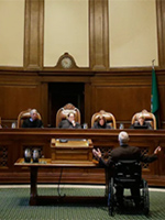 Tom Ahearne in wheelchair before Washington Supreme Court