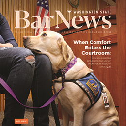 Cover of February 2026 Bar News showing a service dog in court